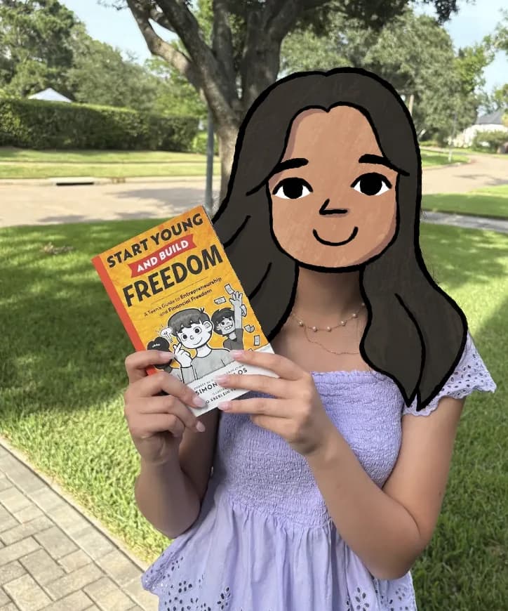 Young reader holding Start Young and Build Freedom